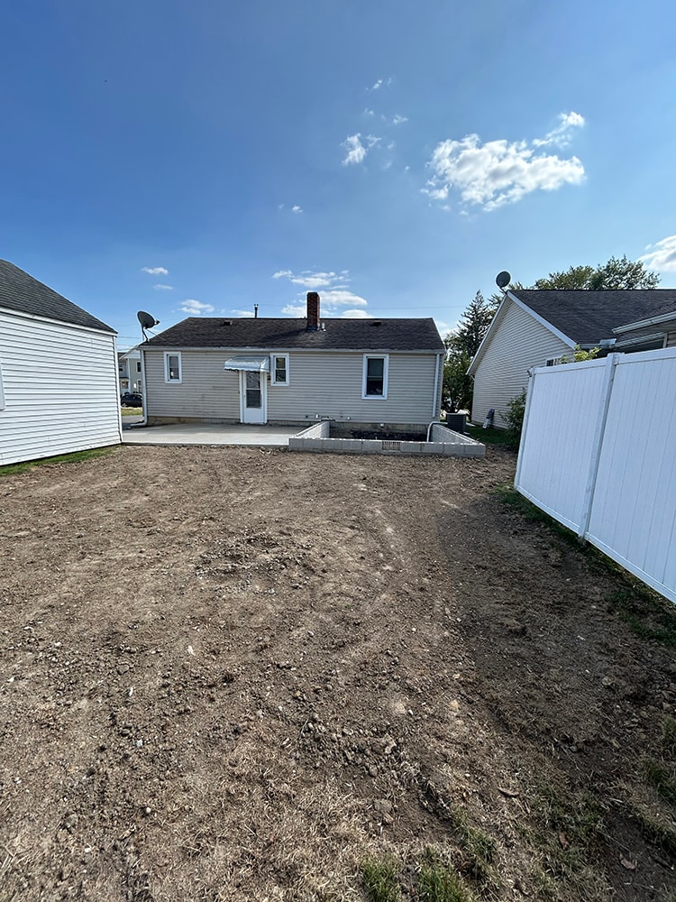 2 story home addition — before: rear yard with new foundation footings — Findlay, Ohio