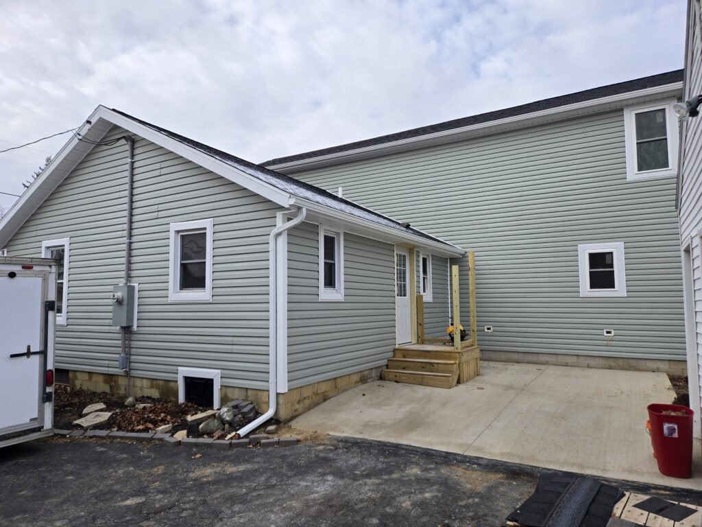 2 story home addition — completed rear exterior with new concrete driveway — Findlay, Ohio