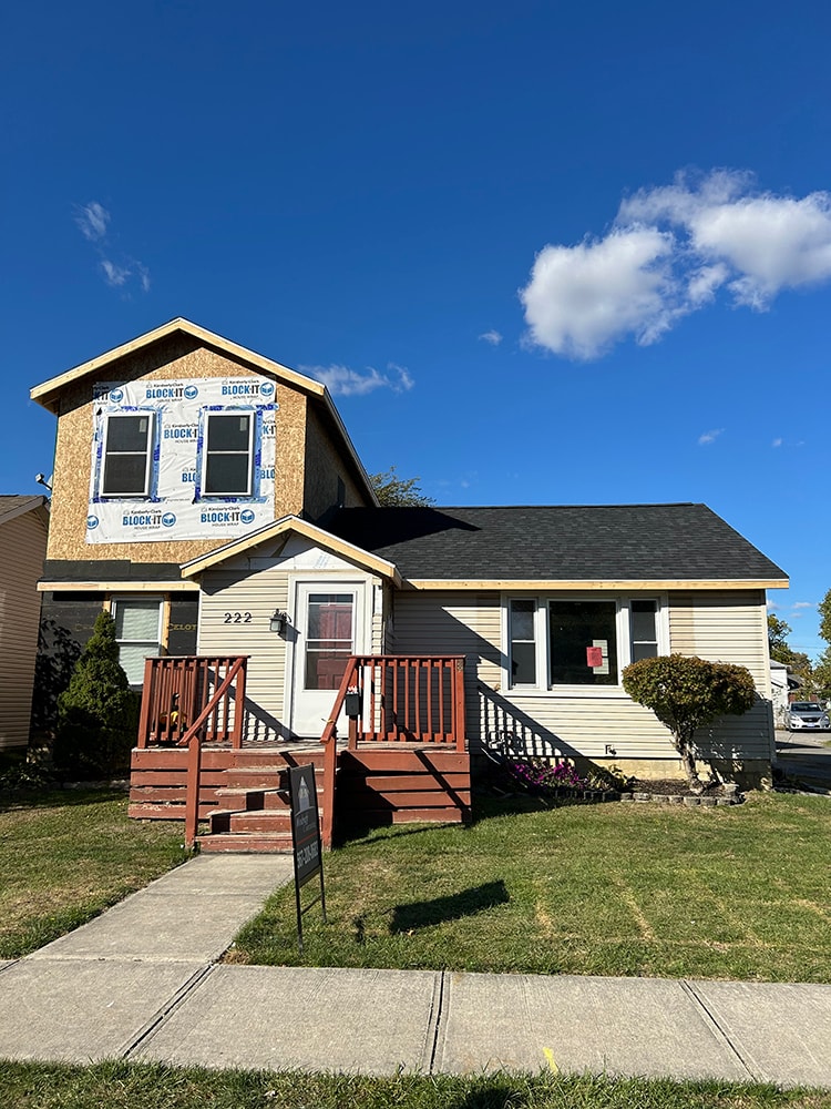 2 story home addition — framing stage front view with second story sheathing — Findlay, Ohio