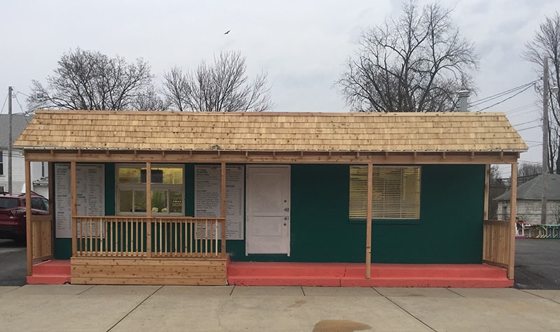 Cedar porch and overhang Findlay — after: straight-on view of completed cedar shake overhang and full-width porch, Findlay, Ohio