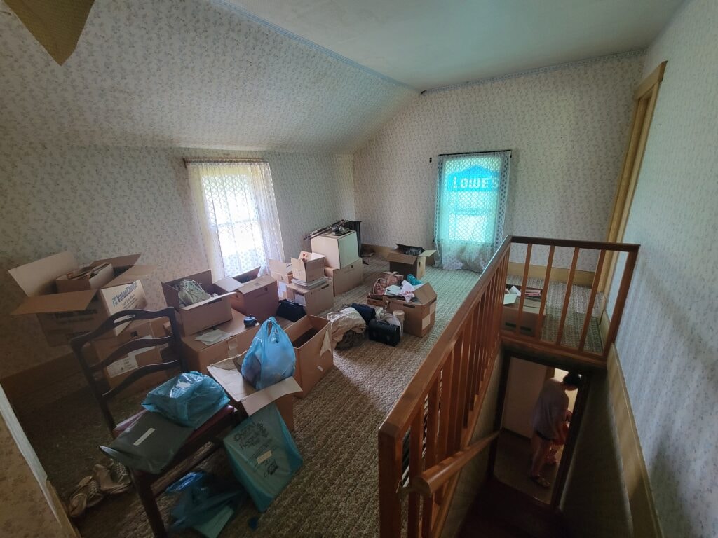 Entire house remodel — during: interior stripped to studs with re-framed walls and new wiring — Arlington, Ohio
