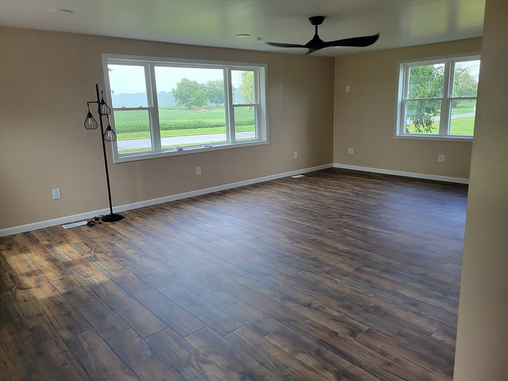 Entire house remodel — after: completed bedroom with new carpet and closet doors — Arlington, Ohio