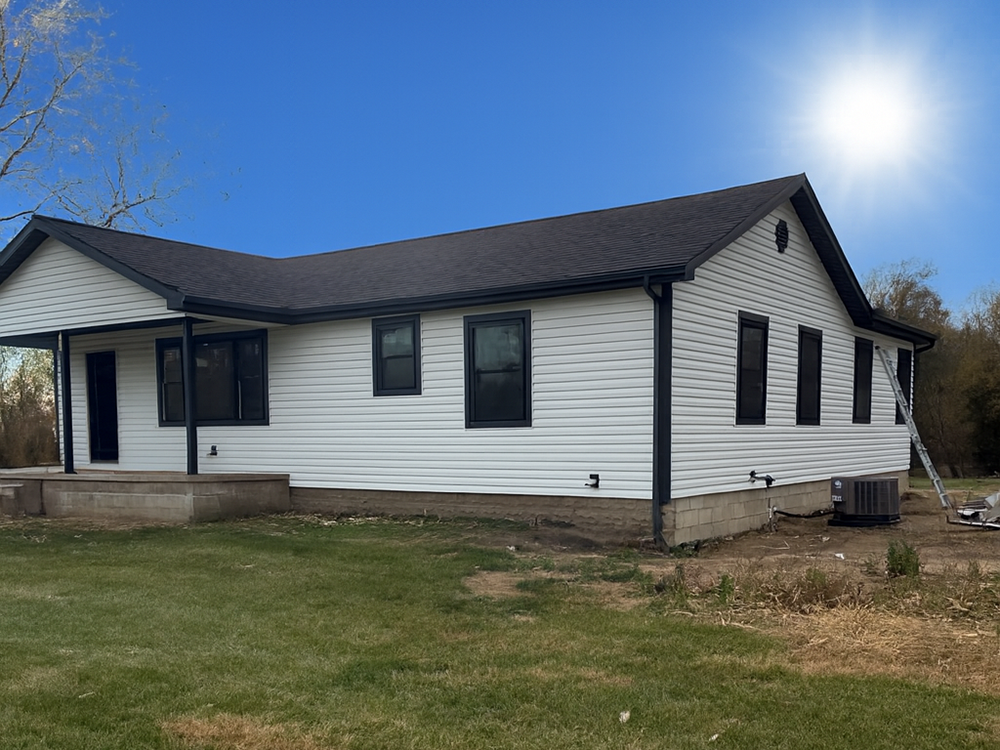 Kitchen & bathroom addition — completed kitchen with dark cabinets and island — Findlay, Ohio