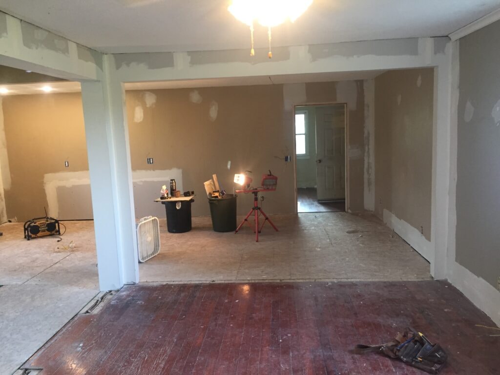 Kitchen family room remodel Arcadia — during: drywall mudded and open-plan layout taking shape, Arcadia, Ohio