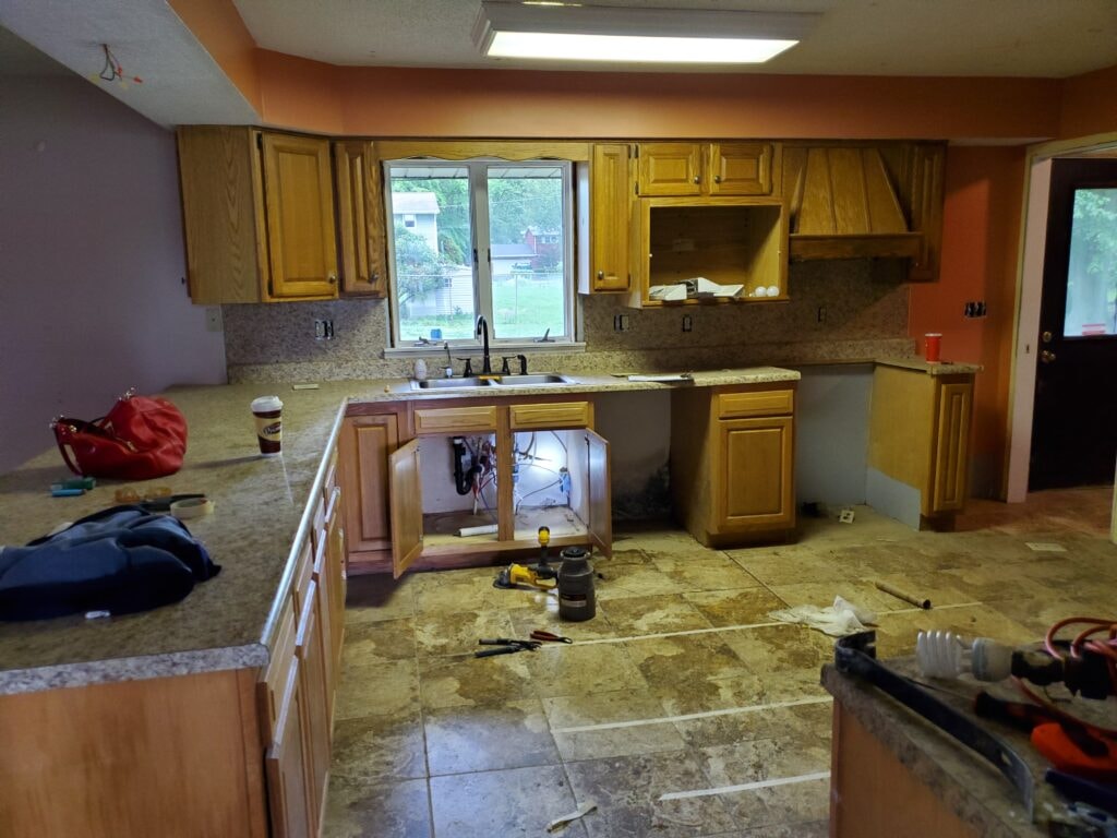 Kitchen remodel Findlay — before: demo in progress, cabinets and plumbing exposed, Findlay, Ohio
