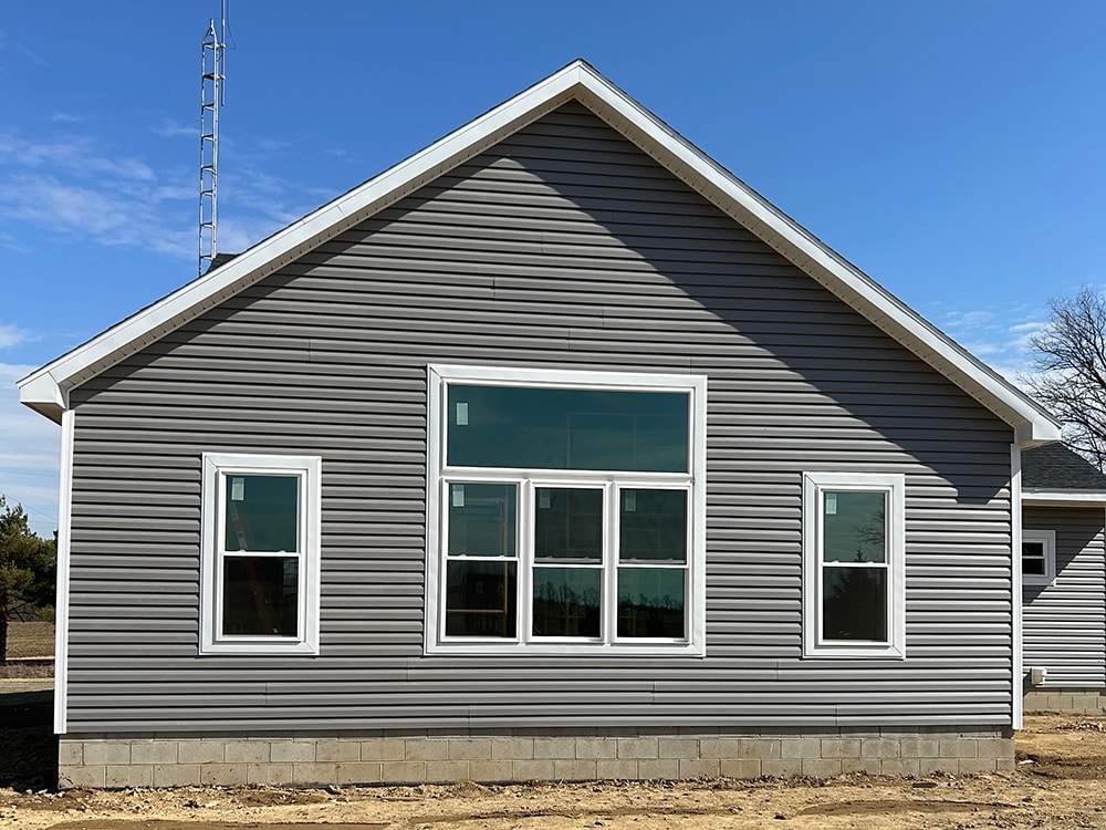 Large home addition — completed gable end with large picture windows — Findlay, Ohio