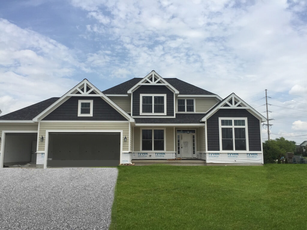 New construction home with AZEK composite siding and wrapped gables — Bowling Green, Ohio