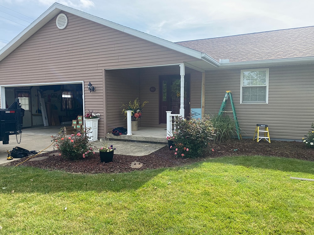 New vinyl siding and stone front porch — Tiffin, Ohio