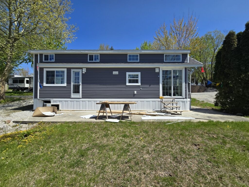 Finished treated deck with partial roof — Wapakoneta, Ohio