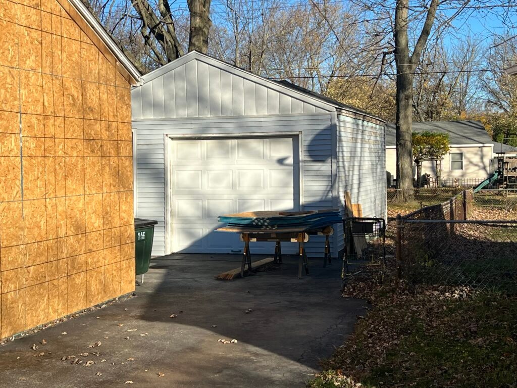New vinyl siding on entire home with rebuilt front porch — Fostoria, Ohio
