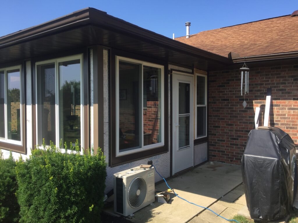 New windows and siding Findlay — sunroom exterior view with new windows installed, Findlay, Ohio
