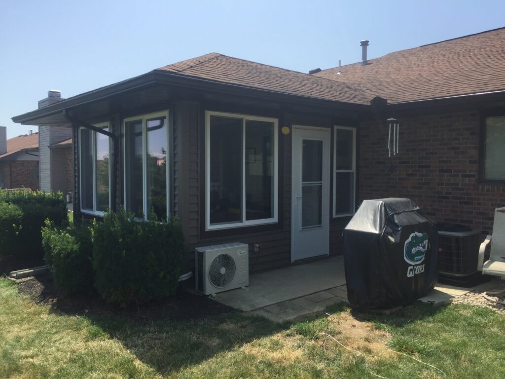 New windows and siding Findlay — completed sunroom exterior with new siding, Findlay, Ohio