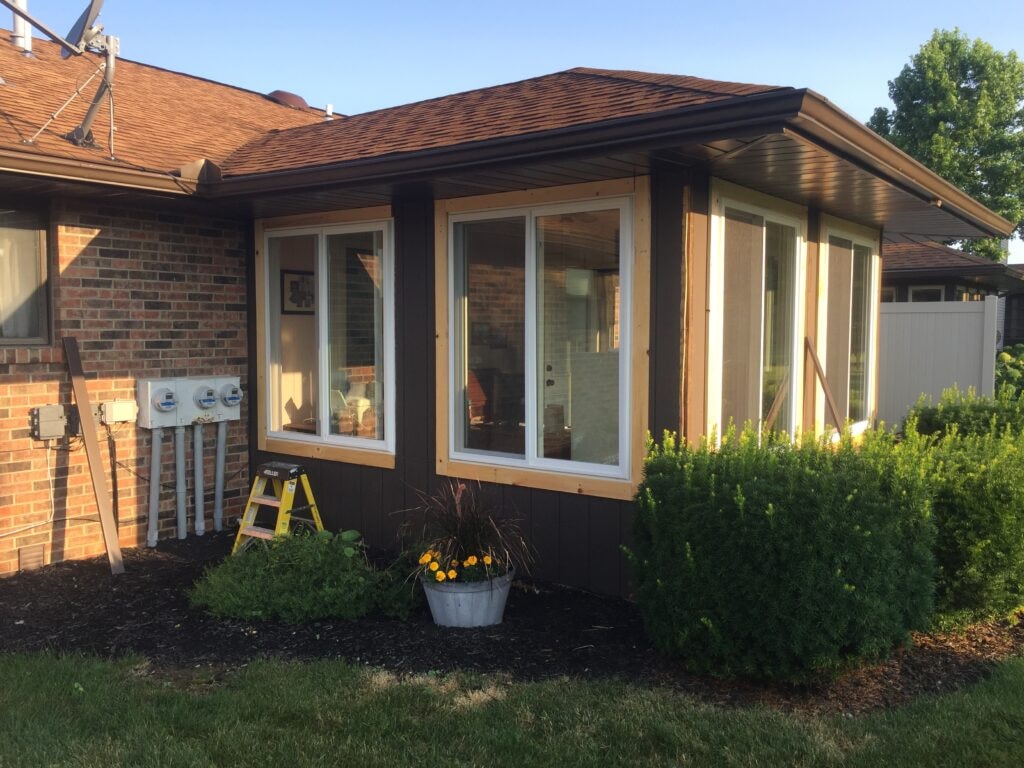 New windows and siding Findlay — front of condo with new replacement windows, Findlay, Ohio