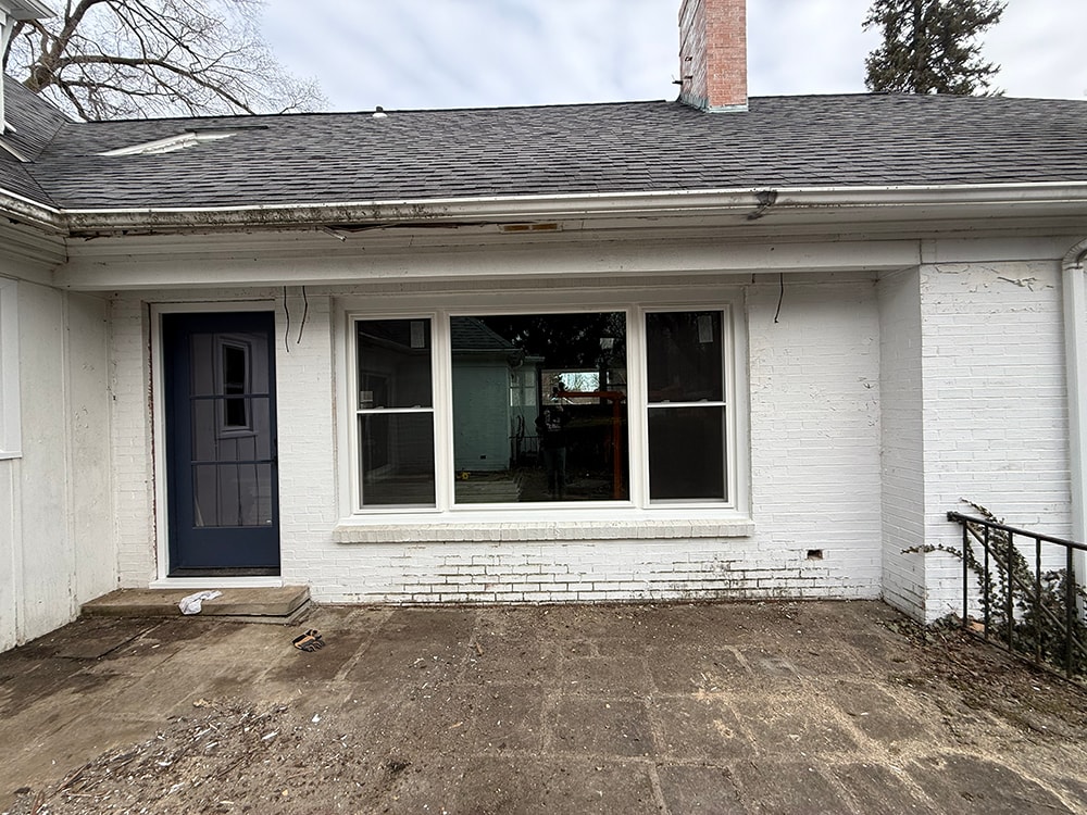 Rear exterior with new windows and navy door — Findlay, Ohio