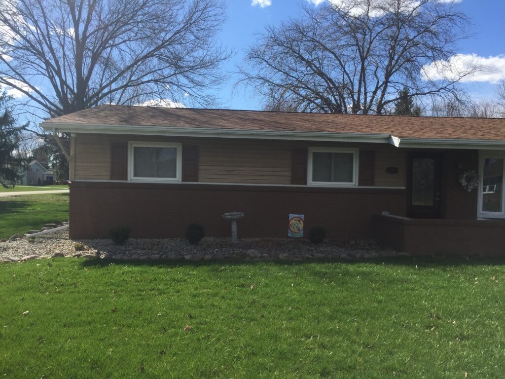 New roof with replaced fascia, soffit, and wrapped windows — Fostoria, Ohio