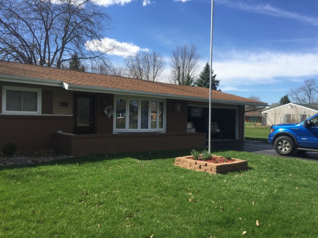 Roof replacement Fostoria — front and garage view of completed new roof, Fostoria, Ohio