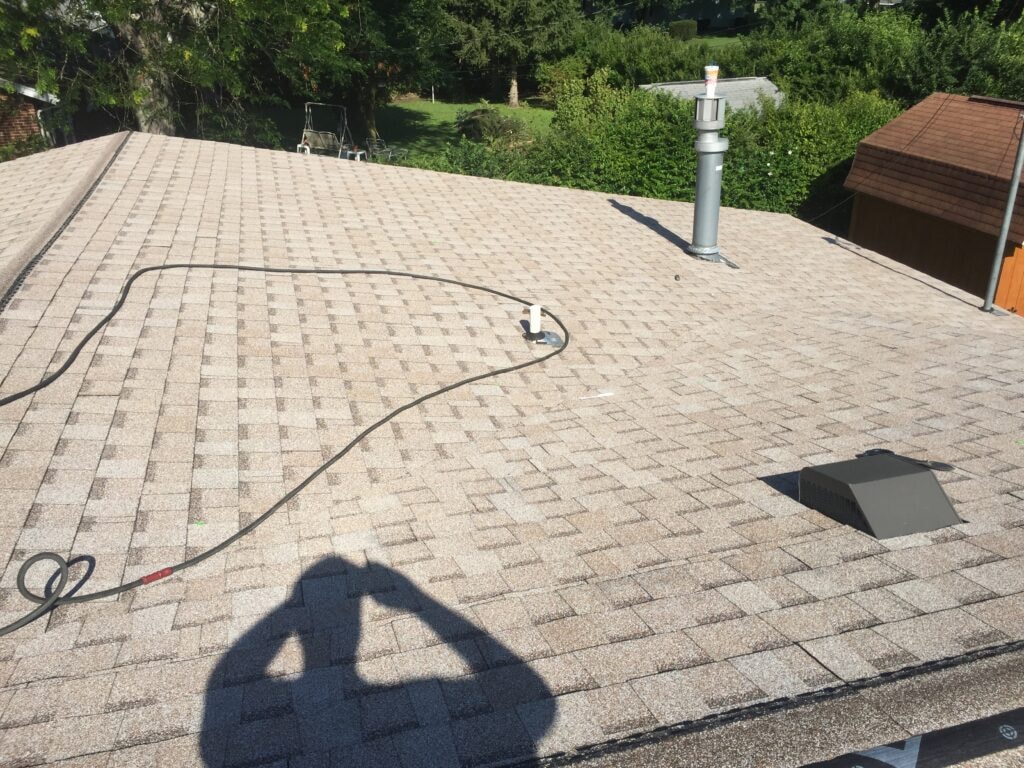 Roof replacement Fostoria — aerial view showing vents and full shingle coverage, Fostoria, Ohio