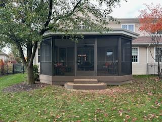 Screened-in composite deck — after: full exterior view of completed screened deck with flat roof and fall foliage — Findlay, Ohio