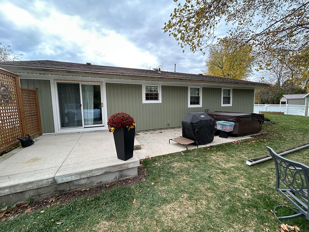 New board and batten siding — rear of home with patio — Findlay, Ohio