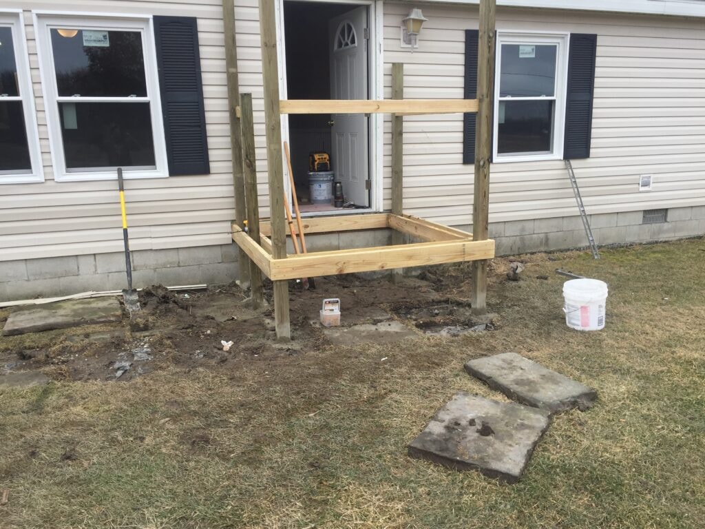 Simple front porch addition Oak Harbor — during: framing and posts set, Oak Harbor, Ohio