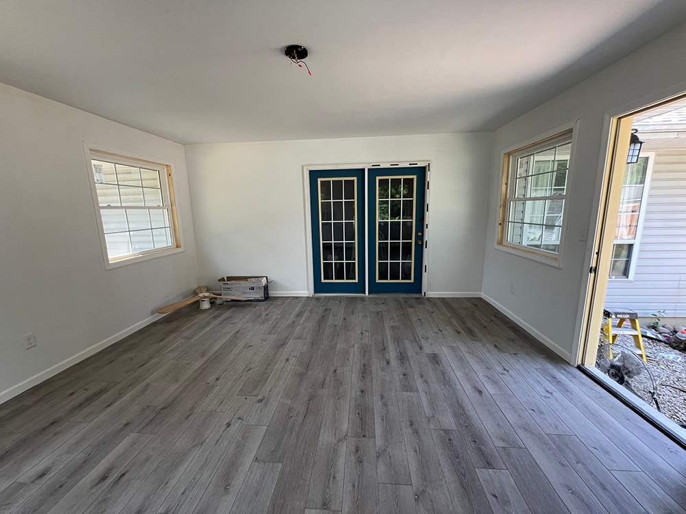 Small home addition — interior finished room with blue French doors — Findlay, Ohio