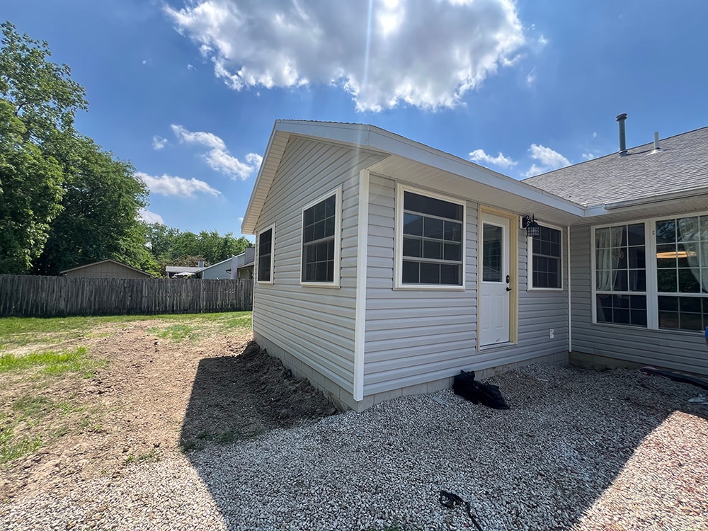 Small home addition — completed exterior with new siding and door — Findlay, Ohio
