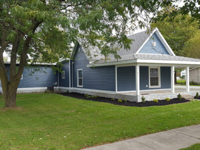 After - New Siding and Landscaping